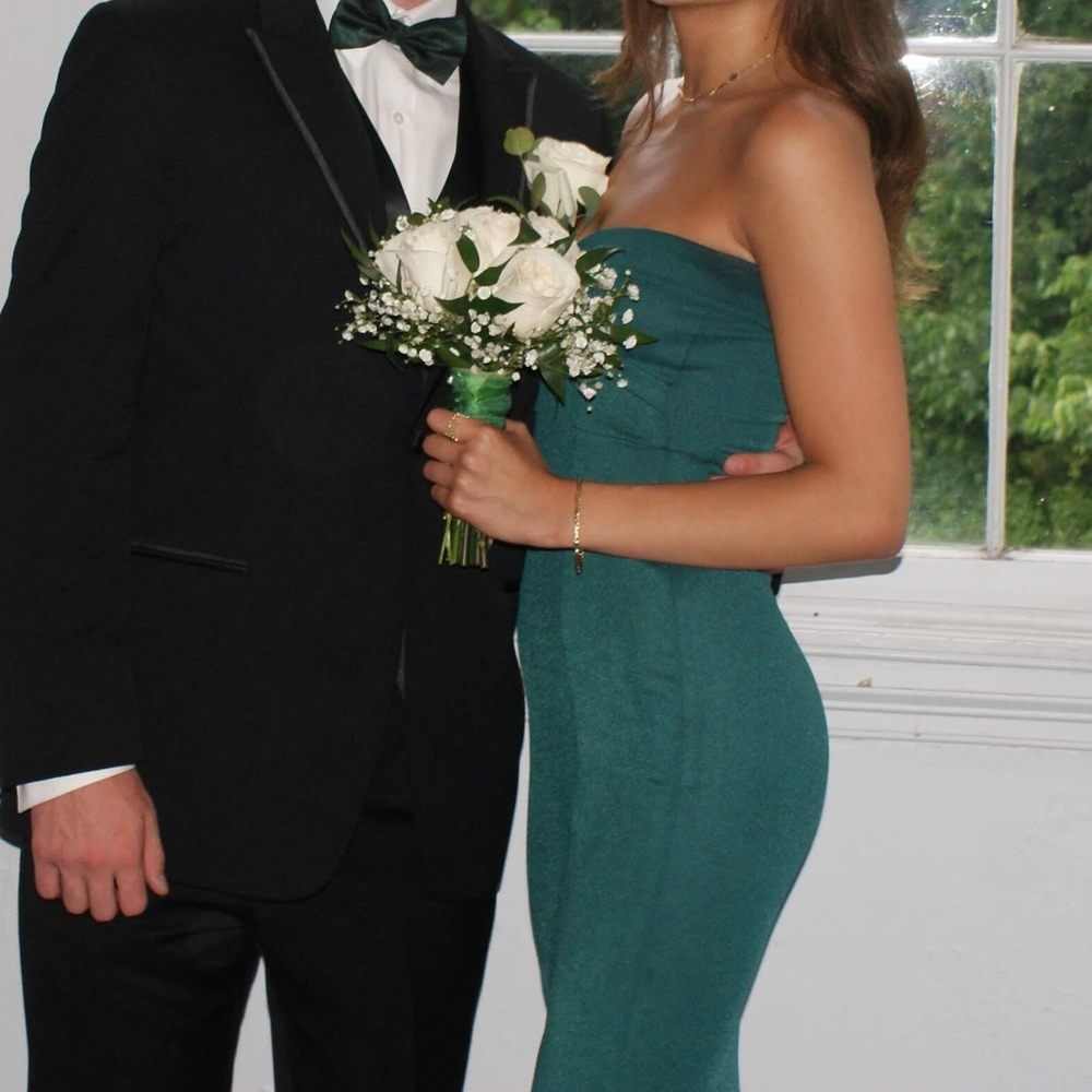 emerald green evening gown with a slit
